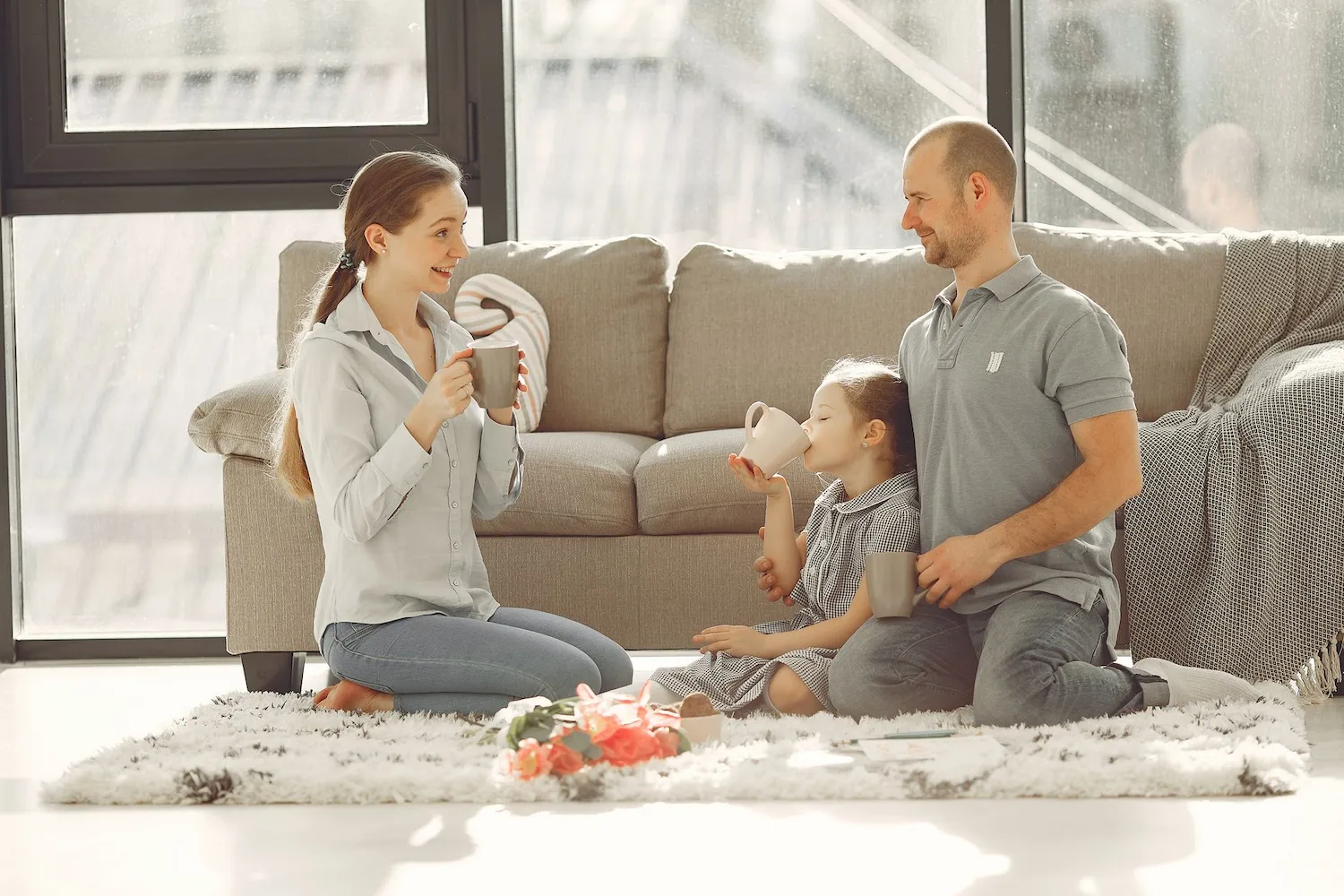 Happy family relaxing comfortably at home