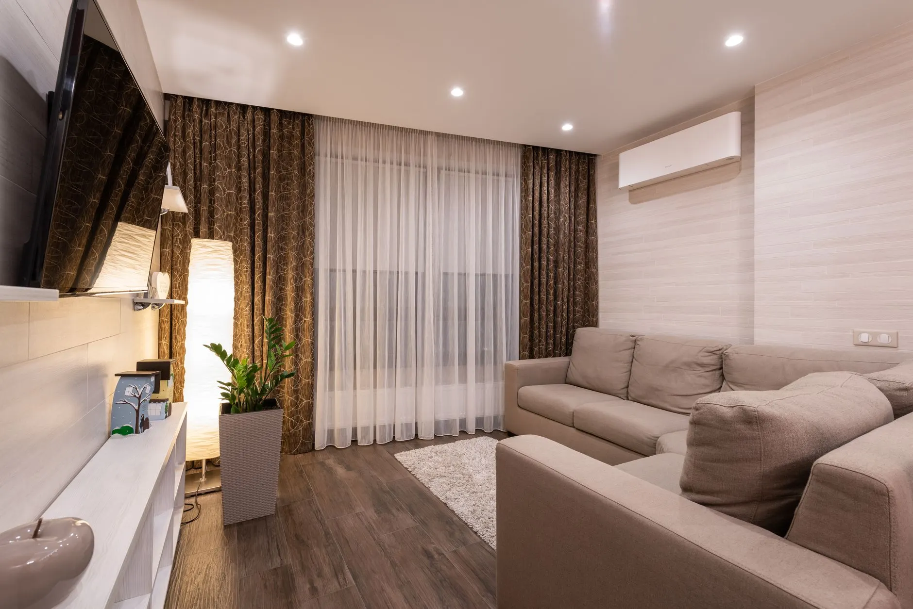 Comfortable living room with air conditioning installed