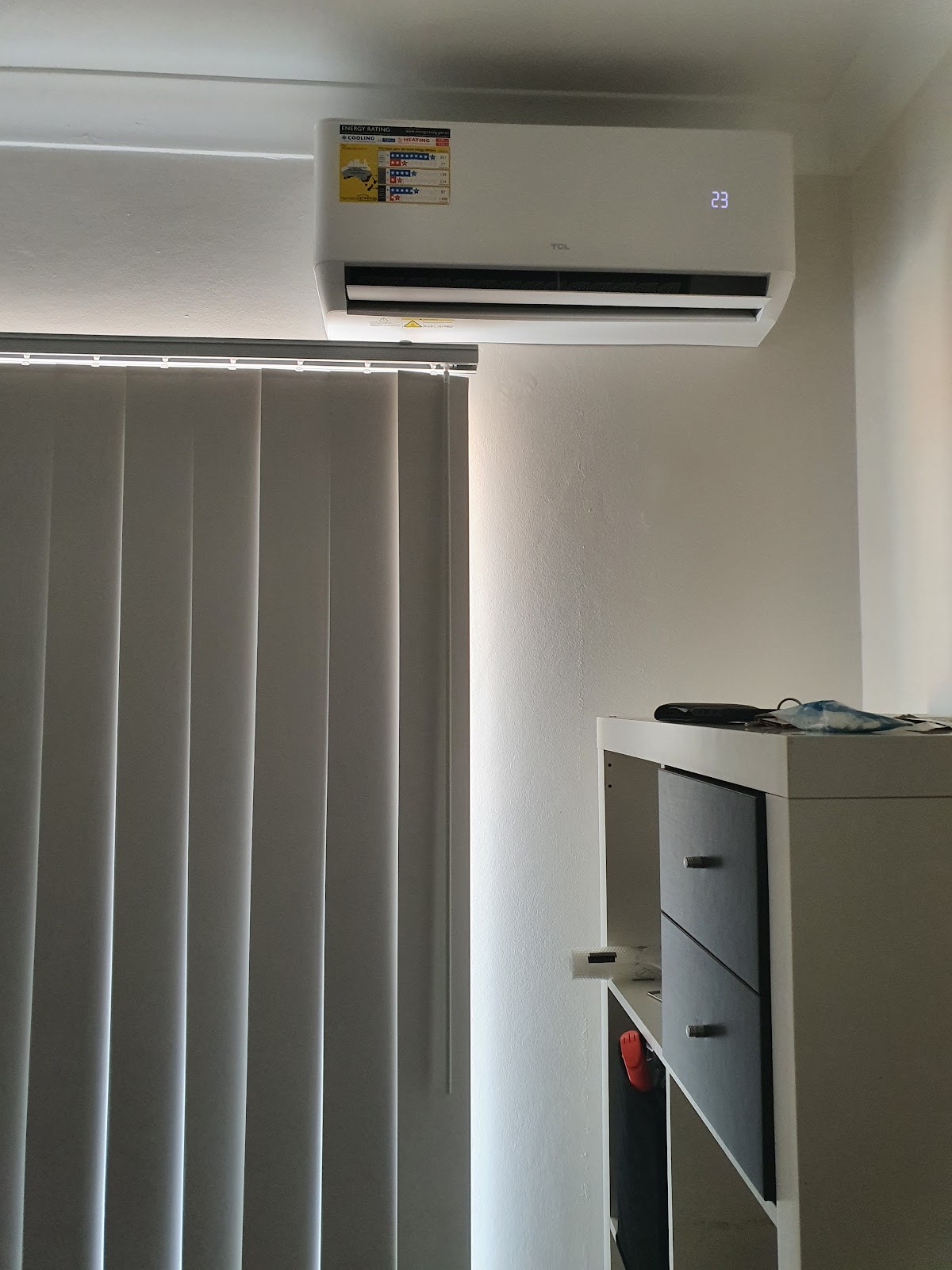 Wall-mounted split system air conditioning unit installed by 000 Air Conditioning Services