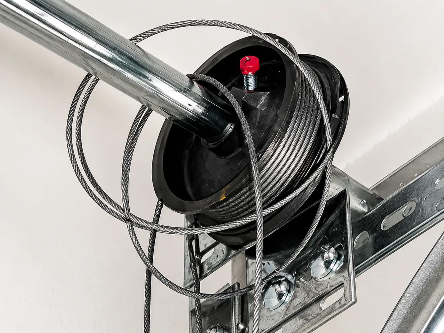 Mandurah Garage Door Repairs garage door opener motor being repaired with exposed wiring and internal components